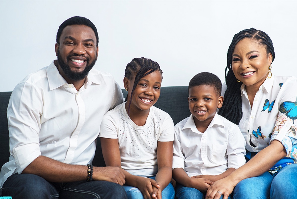 A smiling family of four at Glaze Dental